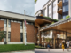 Side-by-side comparison of the standing Chevy Chase Community Center and the proposed design by Rift Valley Chevy Chase, LLC.