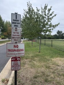 Sign directing parents to drop off location. 