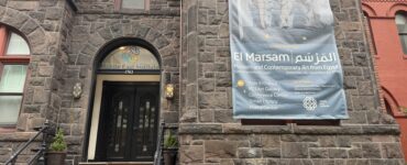 The Middle East Institute entrance with a banner promoting El Marsam, its new exhibition
