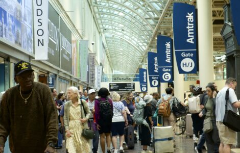 Image of crowd of people waiting for trains at Union Station.