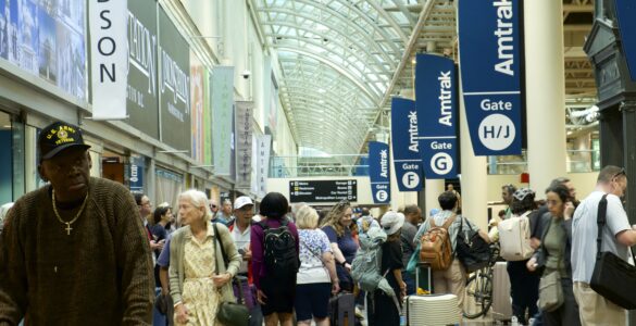 Image of crowd of people waiting for trains at Union Station.