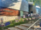 Campaign signs lined up on the grass outside of the Silver Spring Civic Building.