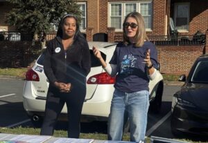 Tarina Keene and Virginia House Majority Leader, Charniele Herring, D-Alexandria speak to canvassers on Oct. 24. Photo/Celeste Hoytt