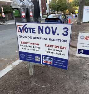red, white and blue election sign that says to vote on Nov. 3