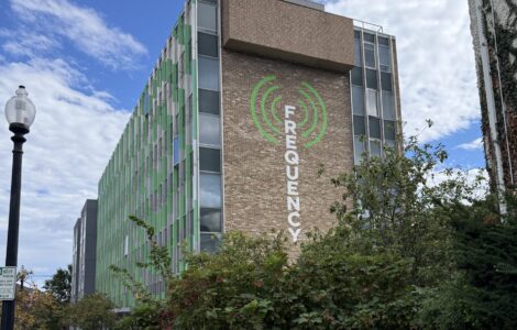 The Frequency building with logo painted on side