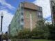 The Frequency building with logo painted on side