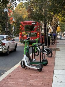 Scooters at bus stop in Ward 3 on New Mexico Ave.